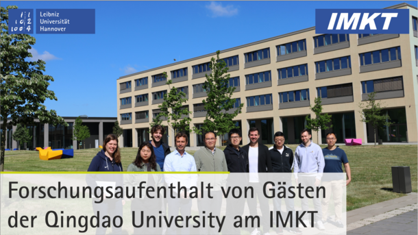 Gruppenfoto von Dr. Zhaogang Jing und Bin Ju von der QUT mit allen Teilnehmern am IMKT-Besuch.